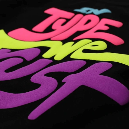 A vibrant and eco-friendly water-based high quality puff print design on fabric by The Apparel Artist.