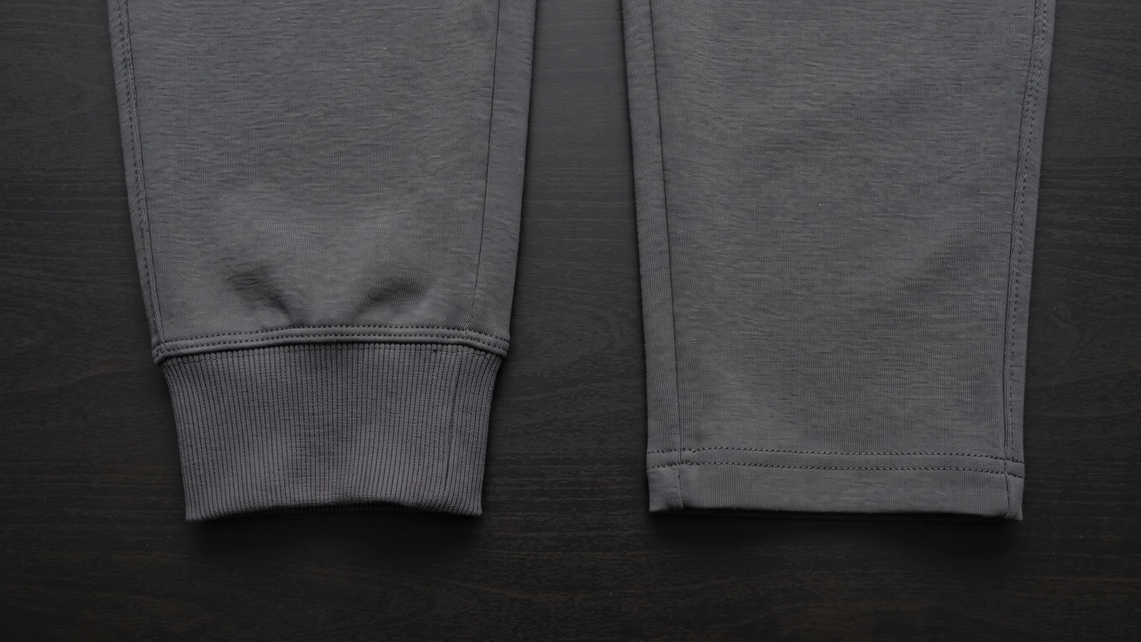 Two jogger hems side by side, a ribbed ankle cuff beside a coverstitched open hem